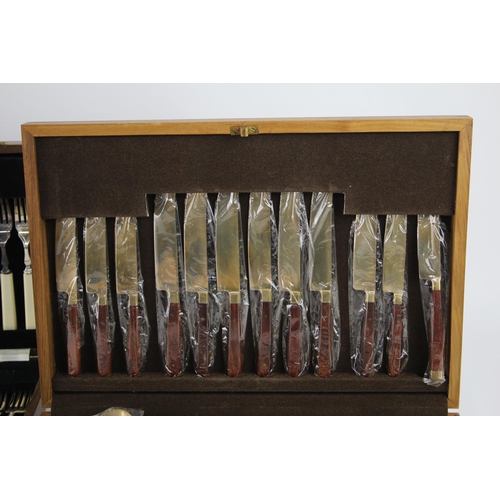 360 - Three vintage wooden cased silver plated cutlery sets