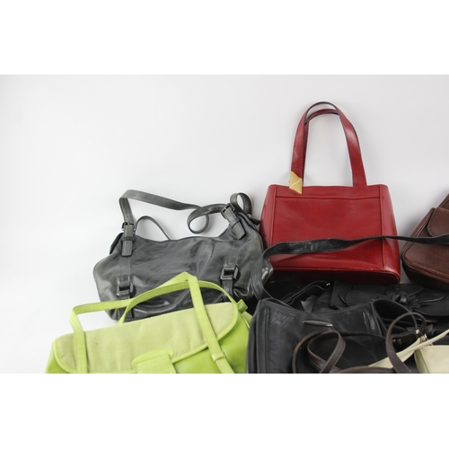 405 - A collection of leather handbags to include Coccinelle, Joop, La Moda etc.