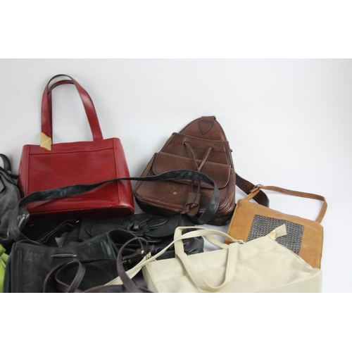 405 - A collection of leather handbags to include Coccinelle, Joop, La Moda etc.