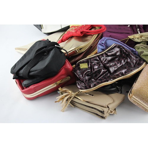 406 - A large collection of handbags to include faux leather, iridescent, clutch etc.