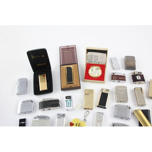 512 - A large collection of cigarette lighters to include Ronson, Colibri, Kingsway etc.