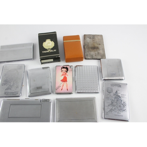 513 - A collection of cigarette cases to include combination, boxed etc.