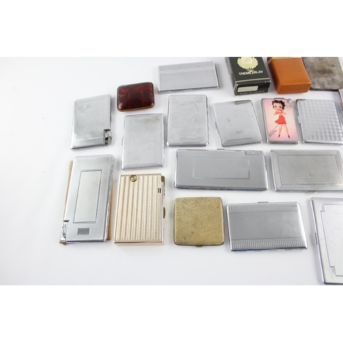 513 - A collection of cigarette cases to include combination, boxed etc.