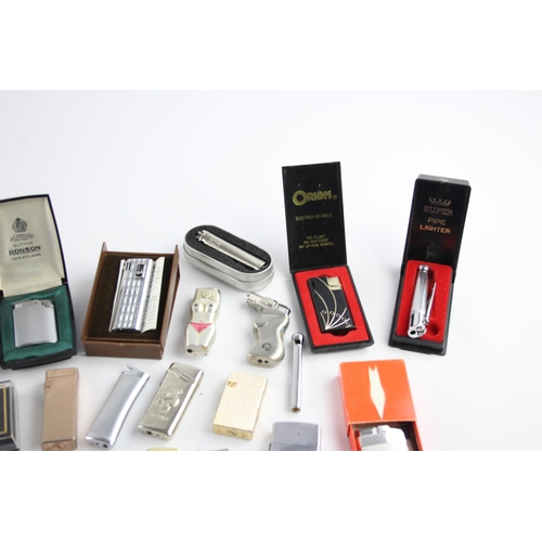 515 - A large collection of cigarette lighters to include Ronson, Colibri, Penguin etc.