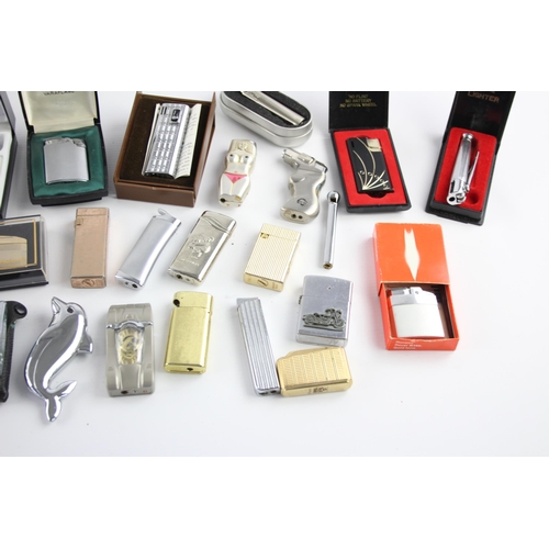 515 - A large collection of cigarette lighters to include Ronson, Colibri, Penguin etc.