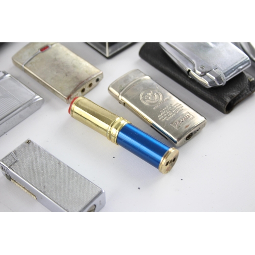 515 - A large collection of cigarette lighters to include Ronson, Colibri, Penguin etc.