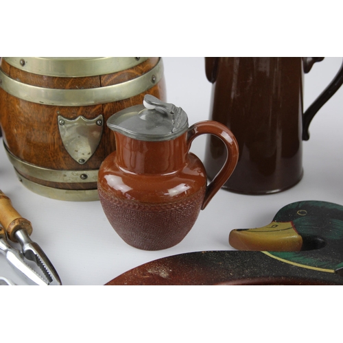 544 - A collection of kitchenalia to include biscuit barrel, cheese board, toast rack etc.