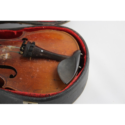 670 - An early 20th century ½ size violin with fitted case