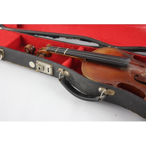 670 - An early 20th century ½ size violin with fitted case