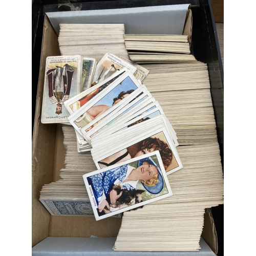 455 - A large collection of vintage collector's cards to include Will's Cigarettes, Brooke Bond etc.