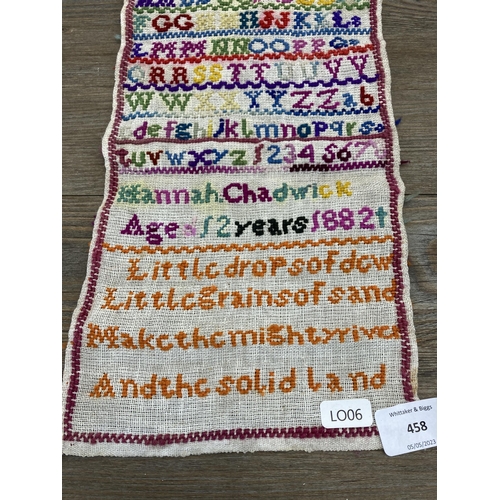 458 - A 19th century unframed sampler by Hannah Chadwick, dated 1882 - approx. 30cm high x 17cm wide