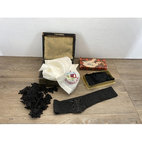 459 - A collection of Victorian and later fabric to include Whitby Jet belt etc.