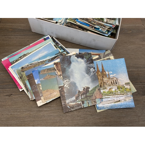 460 - A large collection of vintage postcards