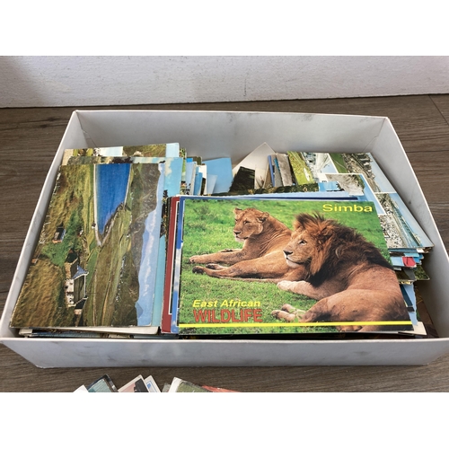 460 - A large collection of vintage postcards