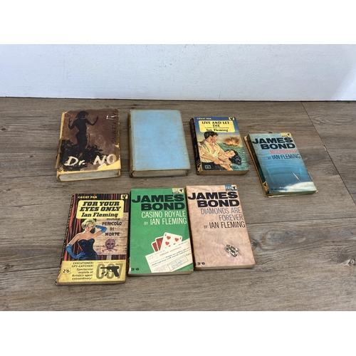 461 - Seven vintage Ian Fleming James Bond books to include 1958 Dr. No 1st Book Club Edition, From Prussi... 