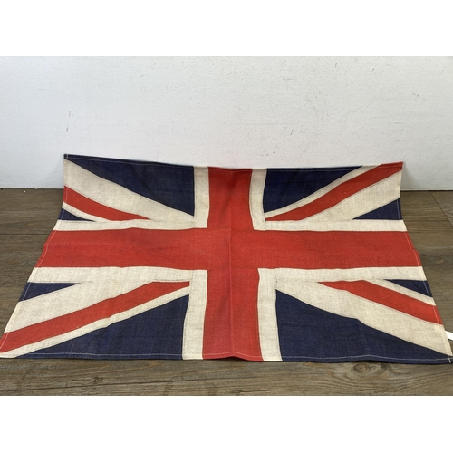 462 - Two Union Jack flags, one 47cm x 74cm and one 48cm x 75cm