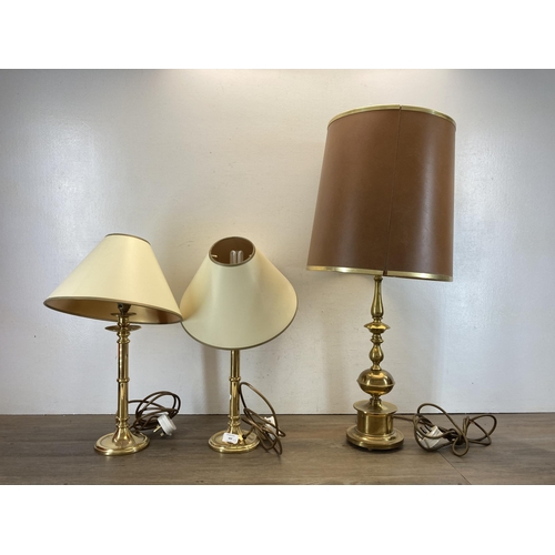 469 - Three brass table lamps