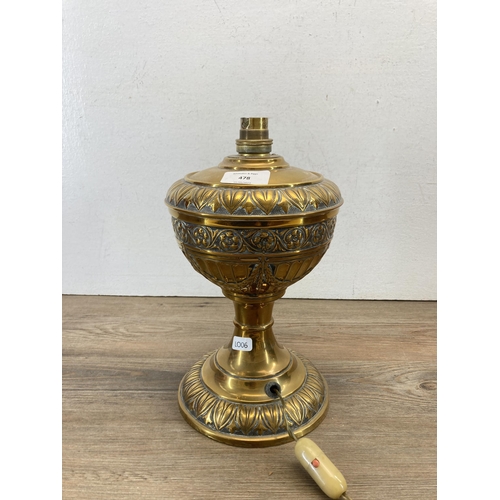 478 - A late 19th century brass electric converted oil lamp - approx. 28cm high