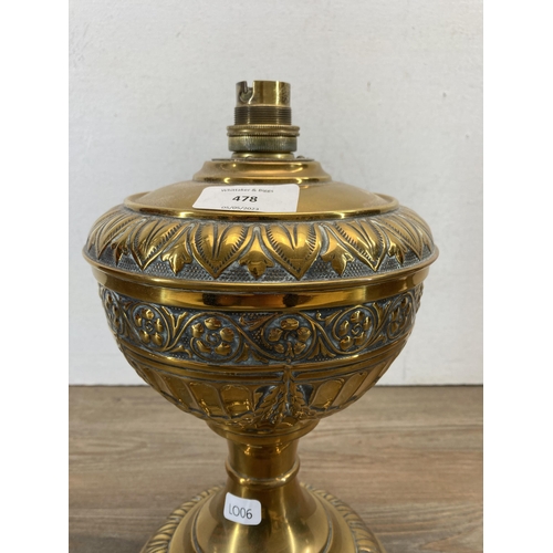 478 - A late 19th century brass electric converted oil lamp - approx. 28cm high