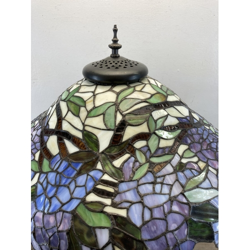 482 - A Tiffany style table lamp - approx. 66cm high