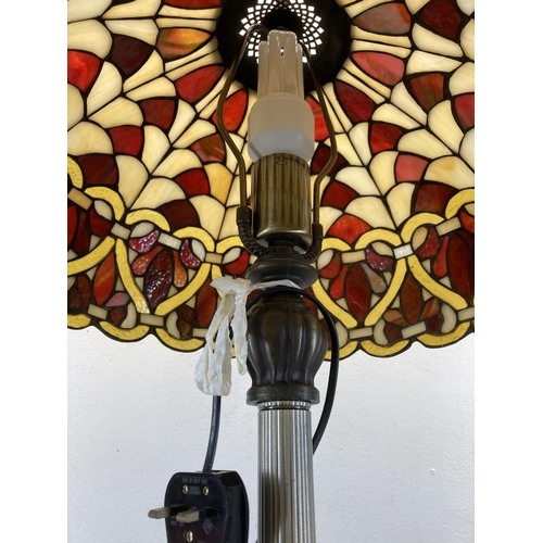 483 - A Tiffany style table lamp - approx. 92cm high