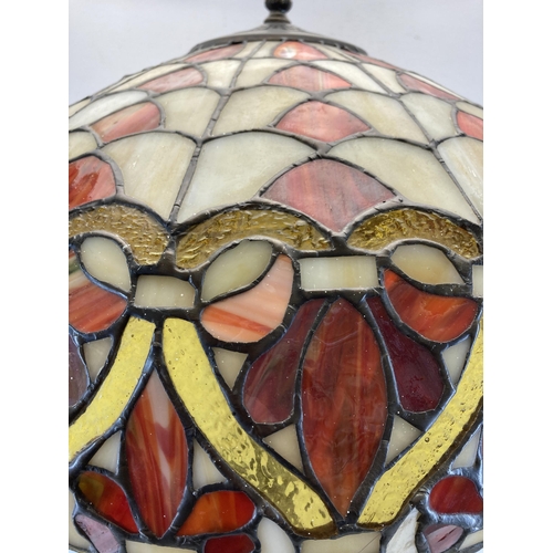 483 - A Tiffany style table lamp - approx. 92cm high