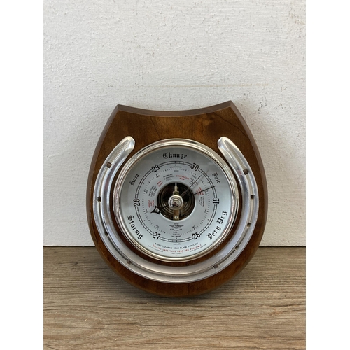 494 - Three items, two Shortland barometers and one Metamec quartz wall clock