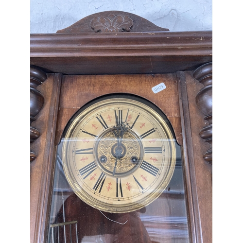 497 - Two wall clocks, one Victorian walnut cased Vienna with pendulum and key - approx. 104cm high and on... 