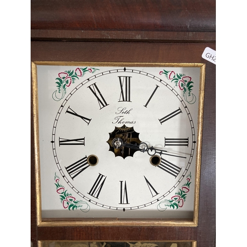 497 - Two wall clocks, one Victorian walnut cased Vienna with pendulum and key - approx. 104cm high and on... 