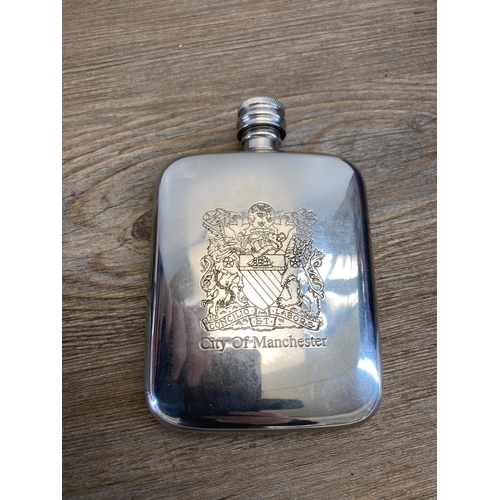 516 - A collection of hipflasks to include Glenfiddich, Jack Daniels etc.