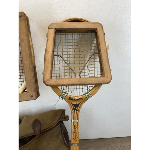 533 - Two vintage tennis rackets with balls and carry bag