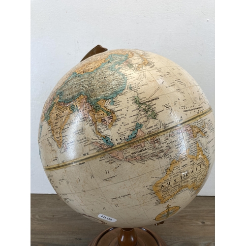 543 - A Replogle World Classic Series 12 inch diameter globe with Bartholomew mini pocket atlas