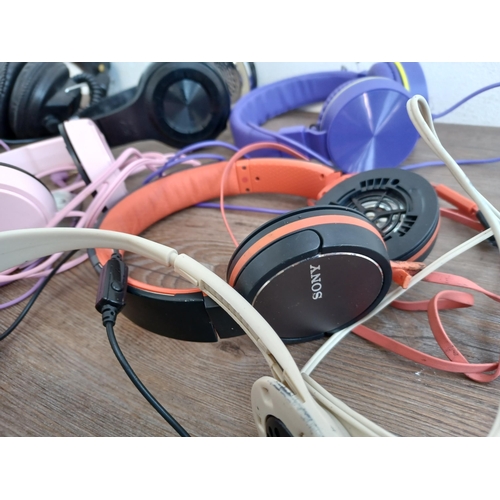 619 - A collection of headphones to include Philips, Sony etc.