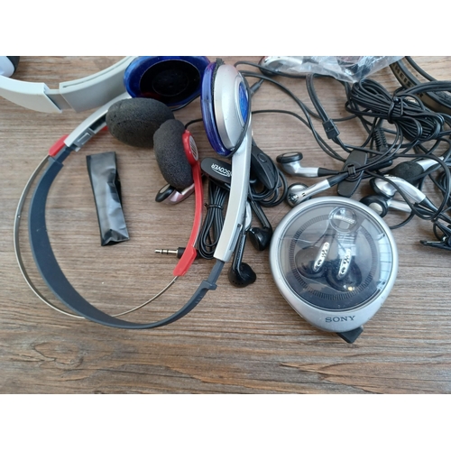 619 - A collection of headphones to include Philips, Sony etc.