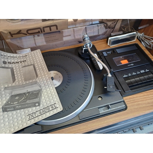 627 - Two items, one boxed Kam DDX5000 direct-drive turntable and one vintage Sanyo JXT4406KL music centre... 