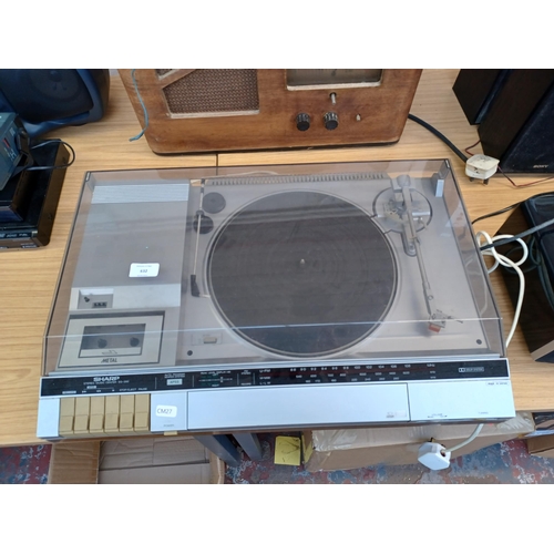 632 - A Sharp SG-280 stereo music centre comprising 
two-speed turntable, three-band tuner/amplifier and D... 