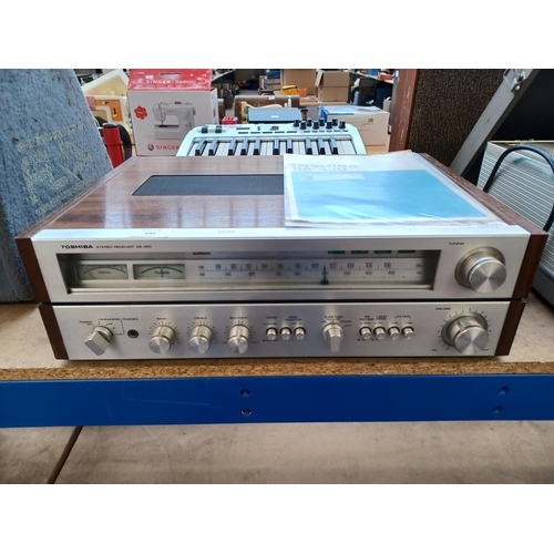 640 - A Toshiba SA-420 two-band stereo receiver with instruction manual