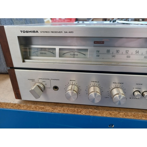 640 - A Toshiba SA-420 two-band stereo receiver with instruction manual