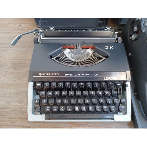 768A - Two vintage portable typewriters, one Olivetti and one Silver-Reed Leader