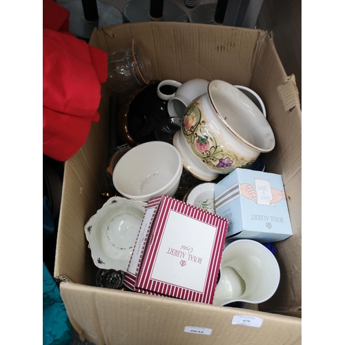 973B - Five boxes containing ceramics, glassware, clothing etc.