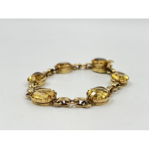 1187 - A 9ct gold yellow topaz panel bracelet, hallmarked Birmingham 1972 - approx. gross weight 17.35 gram... 