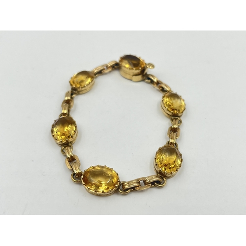 1187 - A 9ct gold yellow topaz panel bracelet, hallmarked Birmingham 1972 - approx. gross weight 17.35 gram... 