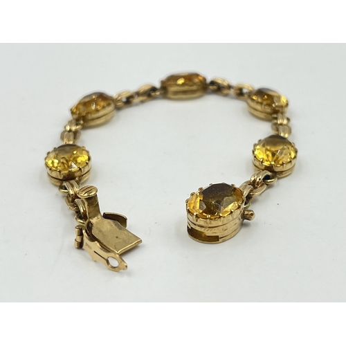 1187 - A 9ct gold yellow topaz panel bracelet, hallmarked Birmingham 1972 - approx. gross weight 17.35 gram... 