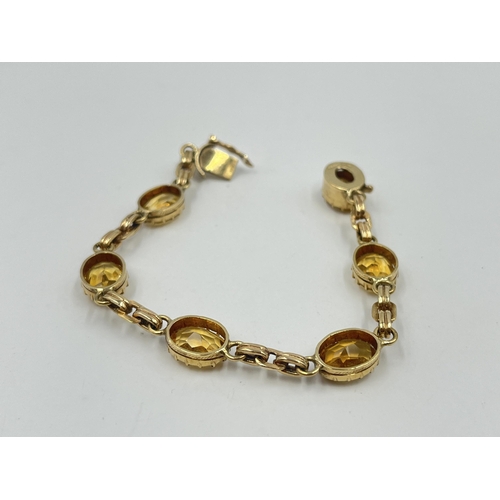 1187 - A 9ct gold yellow topaz panel bracelet, hallmarked Birmingham 1972 - approx. gross weight 17.35 gram... 