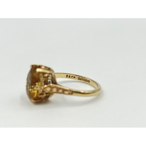 1188 - A 9ct gold yellow topaz solitaire ring, hallmarked Birmingham 1973, size O½ - approx. gross weight 3... 