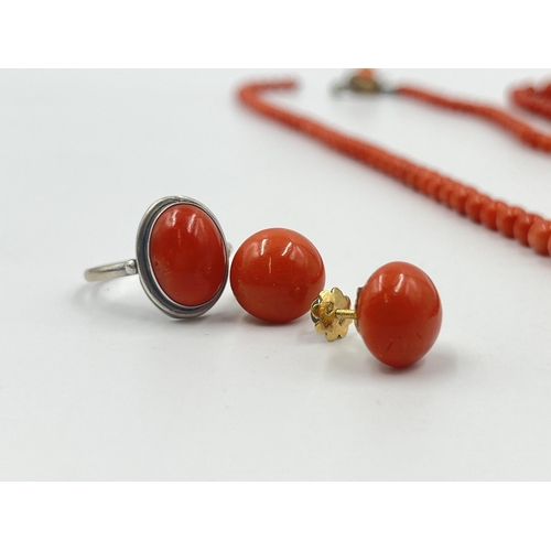 1190 - Four pieces of coral jewellery to include a pair of stamped 18ct gold earrings - approx. gross weigh... 