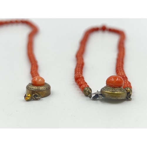 1190 - Four pieces of coral jewellery to include a pair of stamped 18ct gold earrings - approx. gross weigh... 