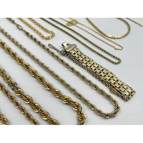 1201 - A collection of yellow metal jewellery to include necklaces, bracelets etc.