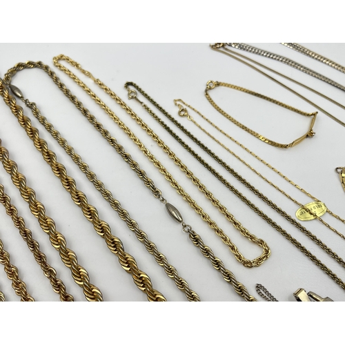 1201 - A collection of yellow metal jewellery to include necklaces, bracelets etc.