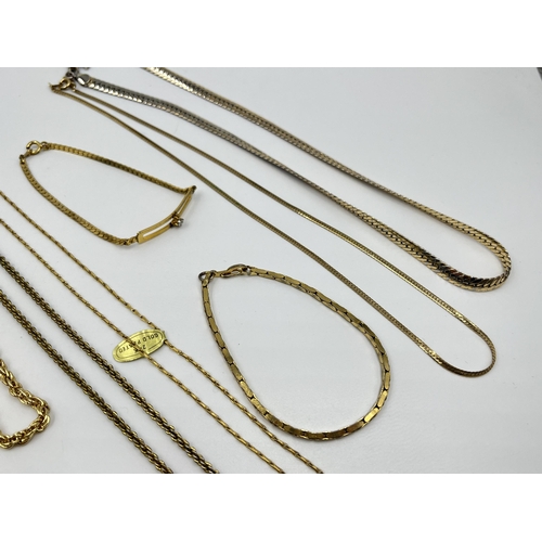 1201 - A collection of yellow metal jewellery to include necklaces, bracelets etc.